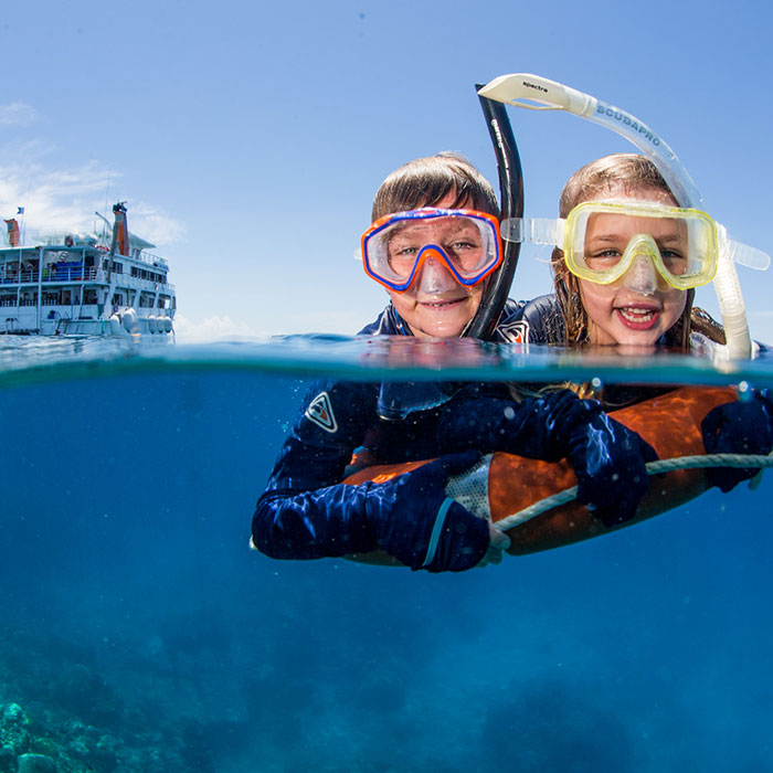 Reef-Encounter-Aft-with-Children-on-Lifering