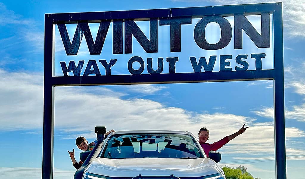 Winto Way Out West Sign